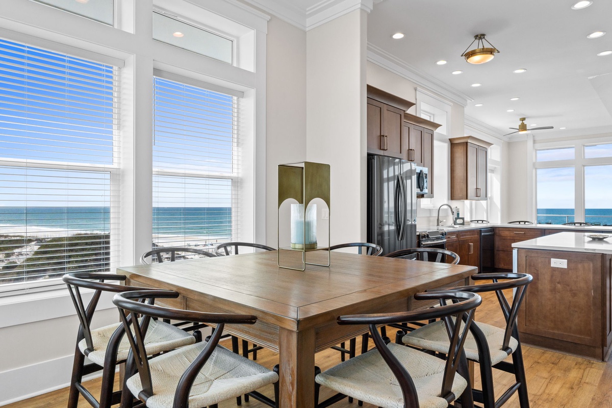 Gather around your elegant dining table while ocean breezes fill this sun-drenched space with stunning sea views.