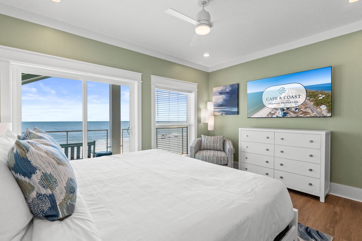 Wake up to peaceful ocean views framing your bed, with soft coastal colors and fresh breezes welcoming you to a restful retreat by the water.