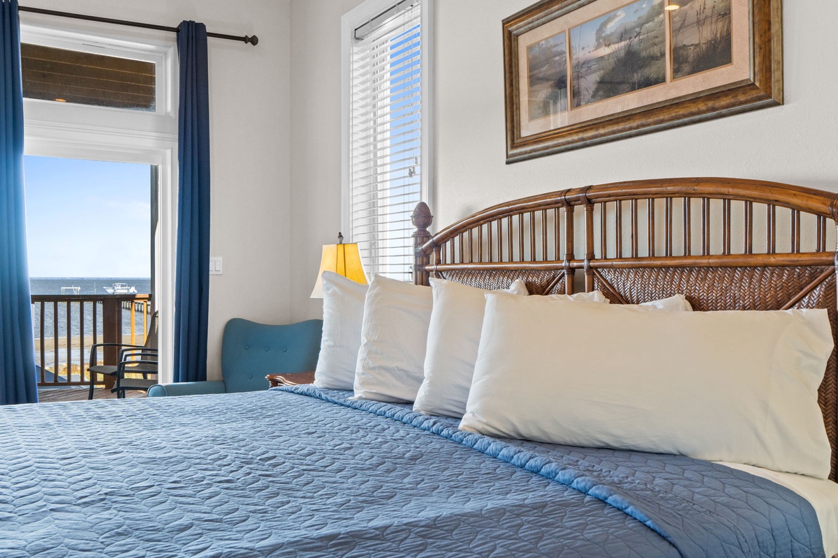 Wake up to ocean views from your comfortable bed, where crisp linens and coastal breezes create the perfect seaside retreat.