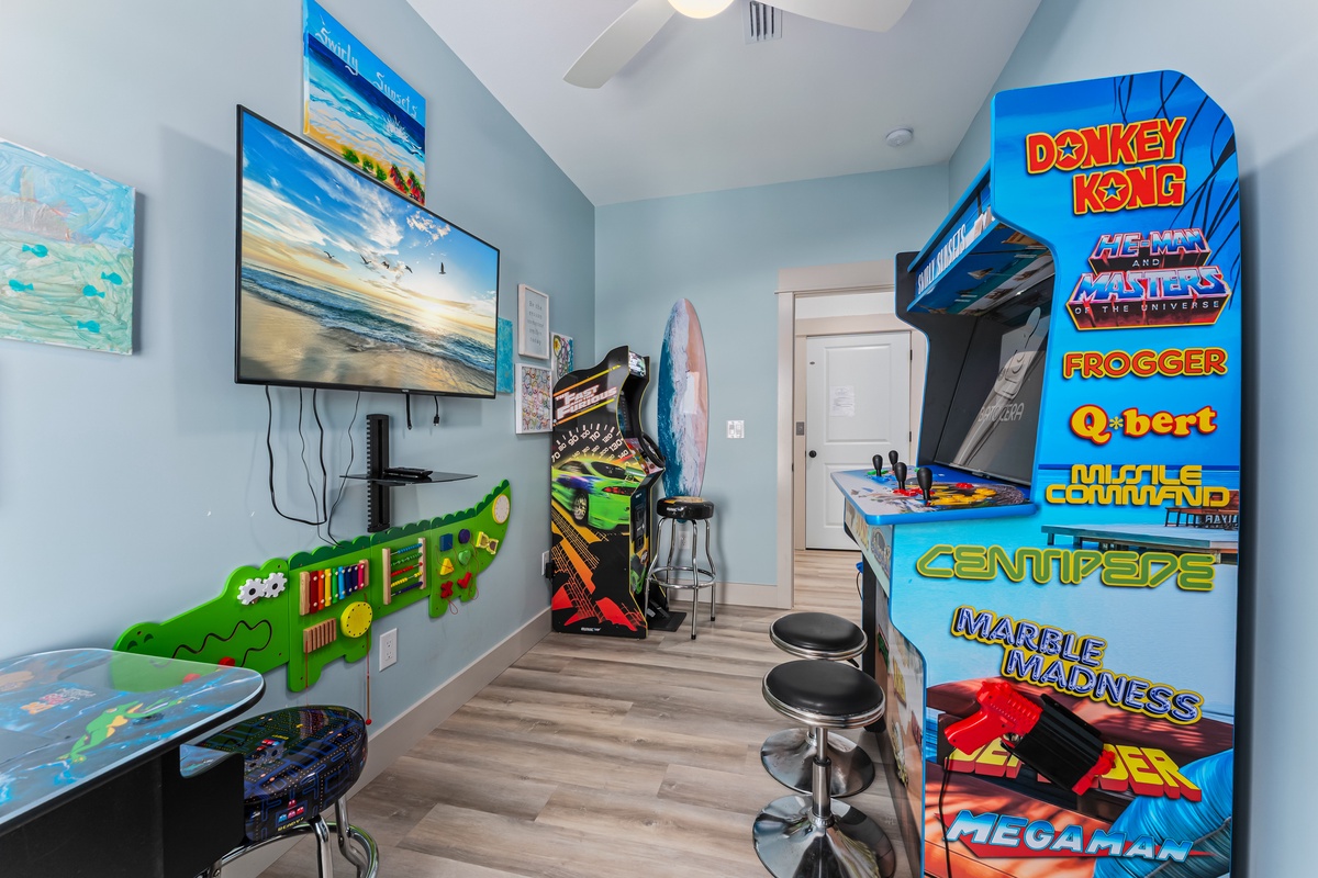 Step into your private arcade paradise with classic games and a large TV for endless entertainment during your stay.