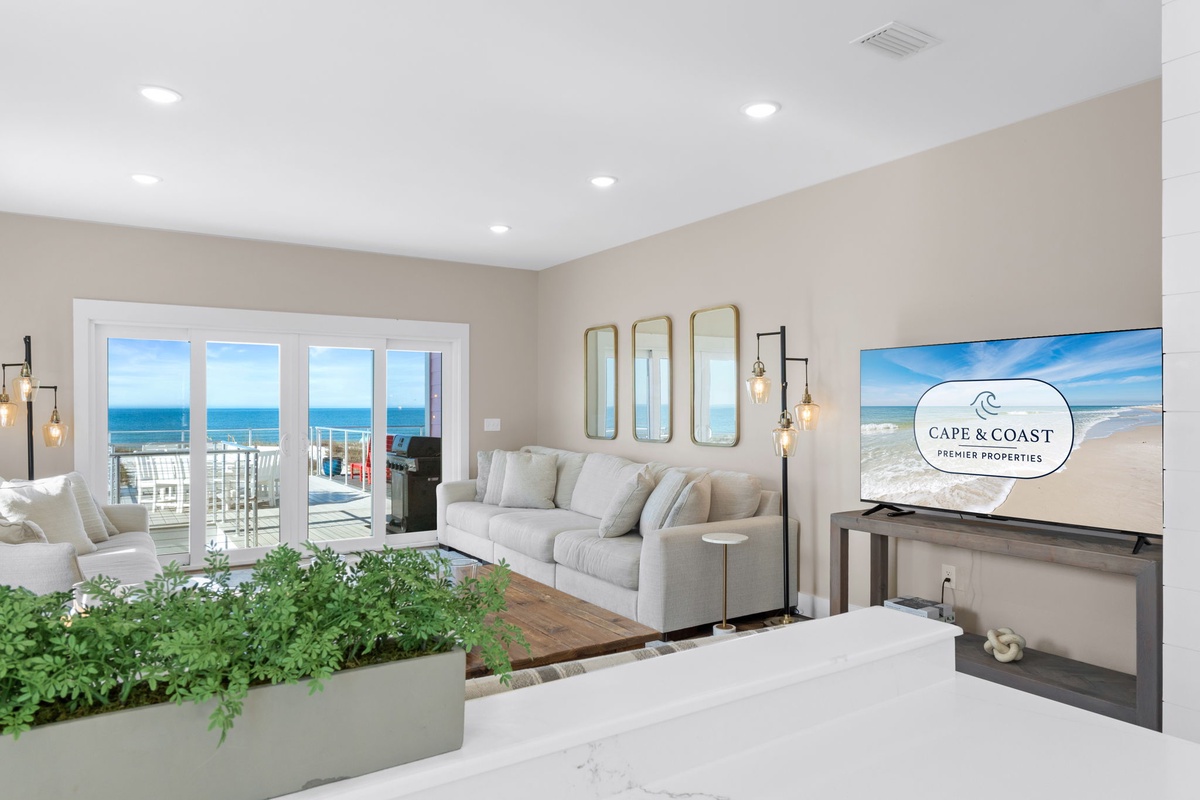 Relax in your bright living space with stunning ocean views and modern amenities for the perfect coastal getaway.