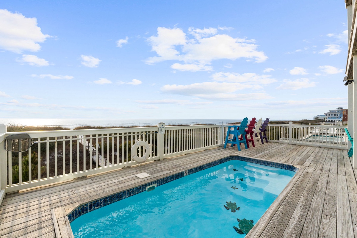 Dive into your private pool while enjoying endless ocean views from this spectacular beachfront deck.