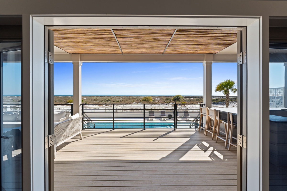 Step onto your private deck where ocean views stretch endlessly before you, creating the perfect spot for morning coffee or sunset wine.