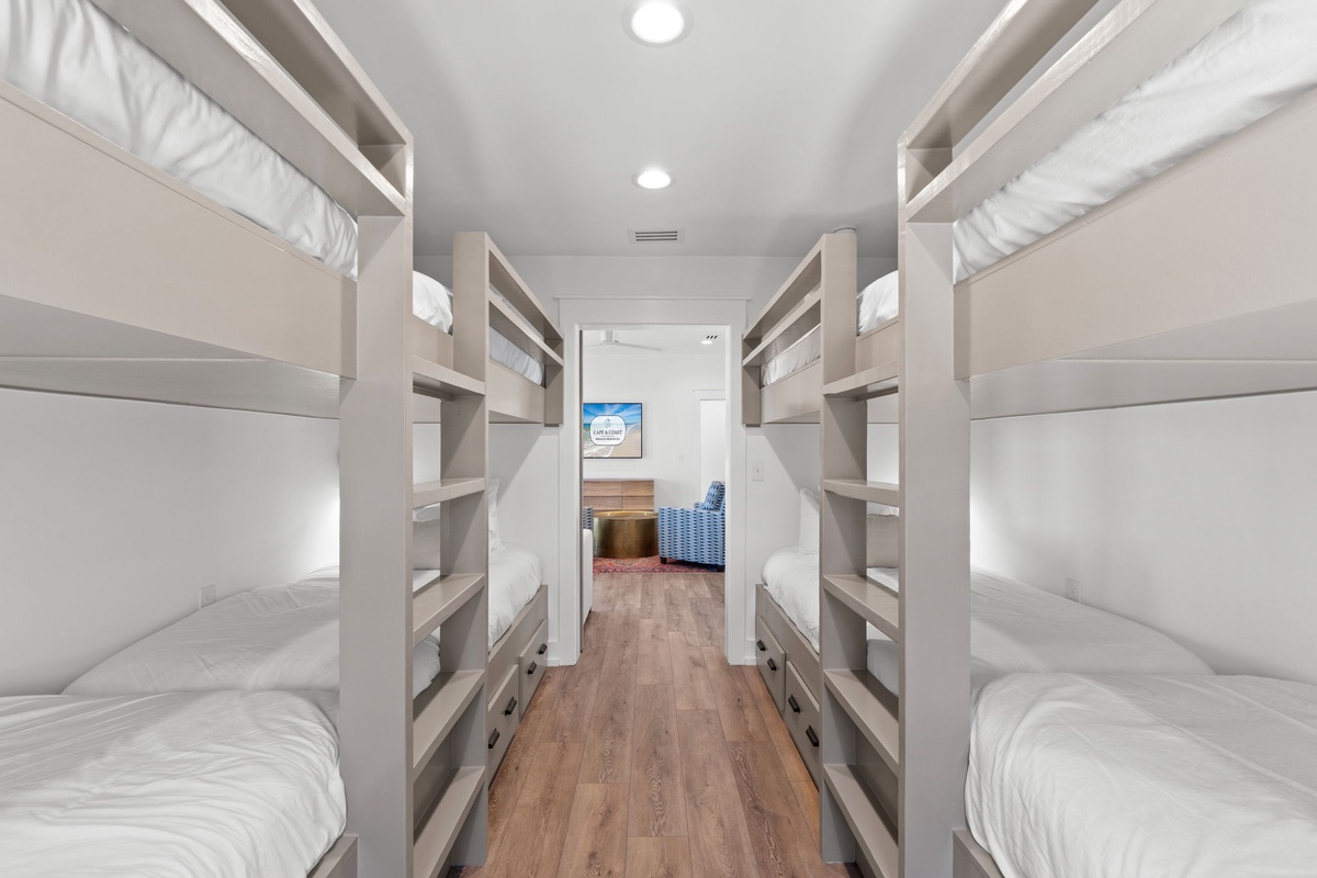 Sleep soundly in your own cozy bunk with fresh linens and modern design for a comfortable night's rest.
