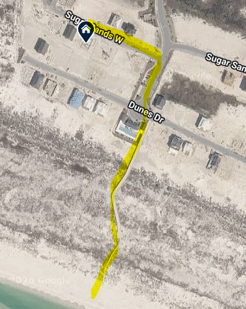 Aerial view showing beach access via community boardwalk.