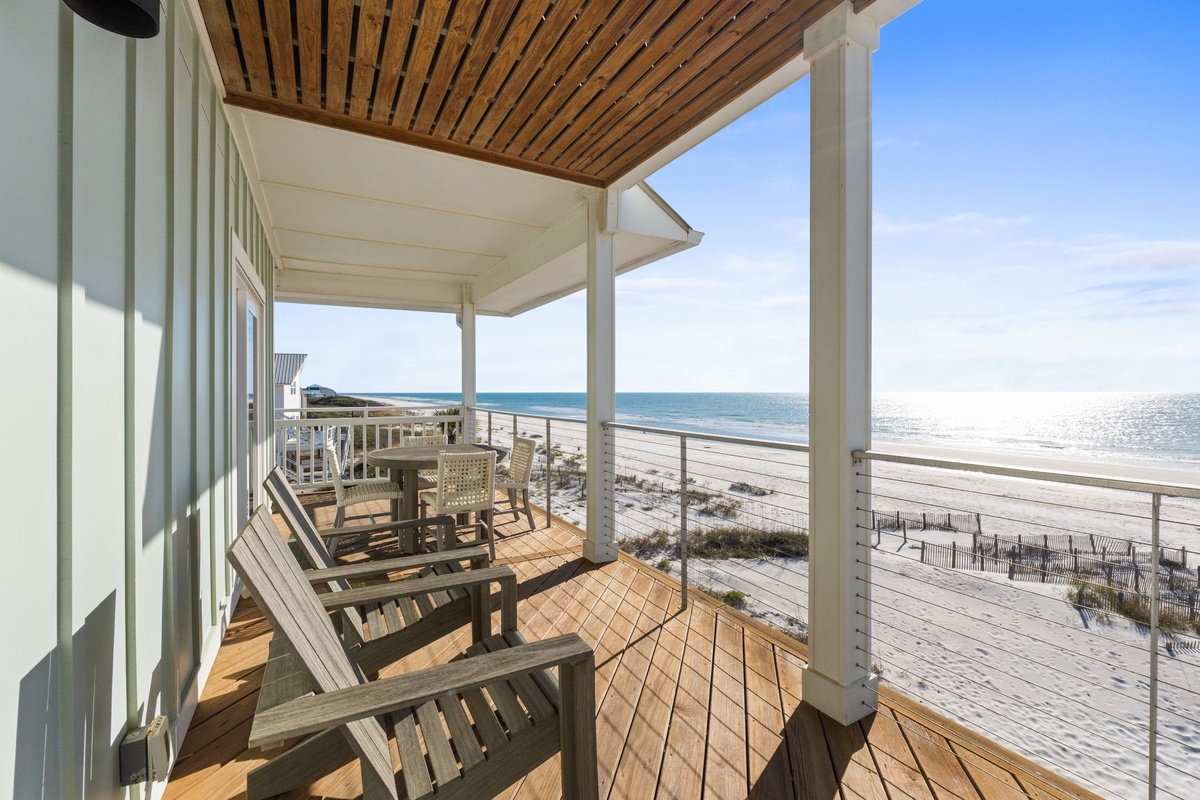 Your private balcony offers stunning ocean views and comfortable seating for morning coffee or sunset relaxation.