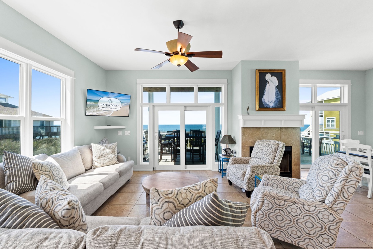 Relax in your bright living room with coastal views and cozy seating for the whole family.