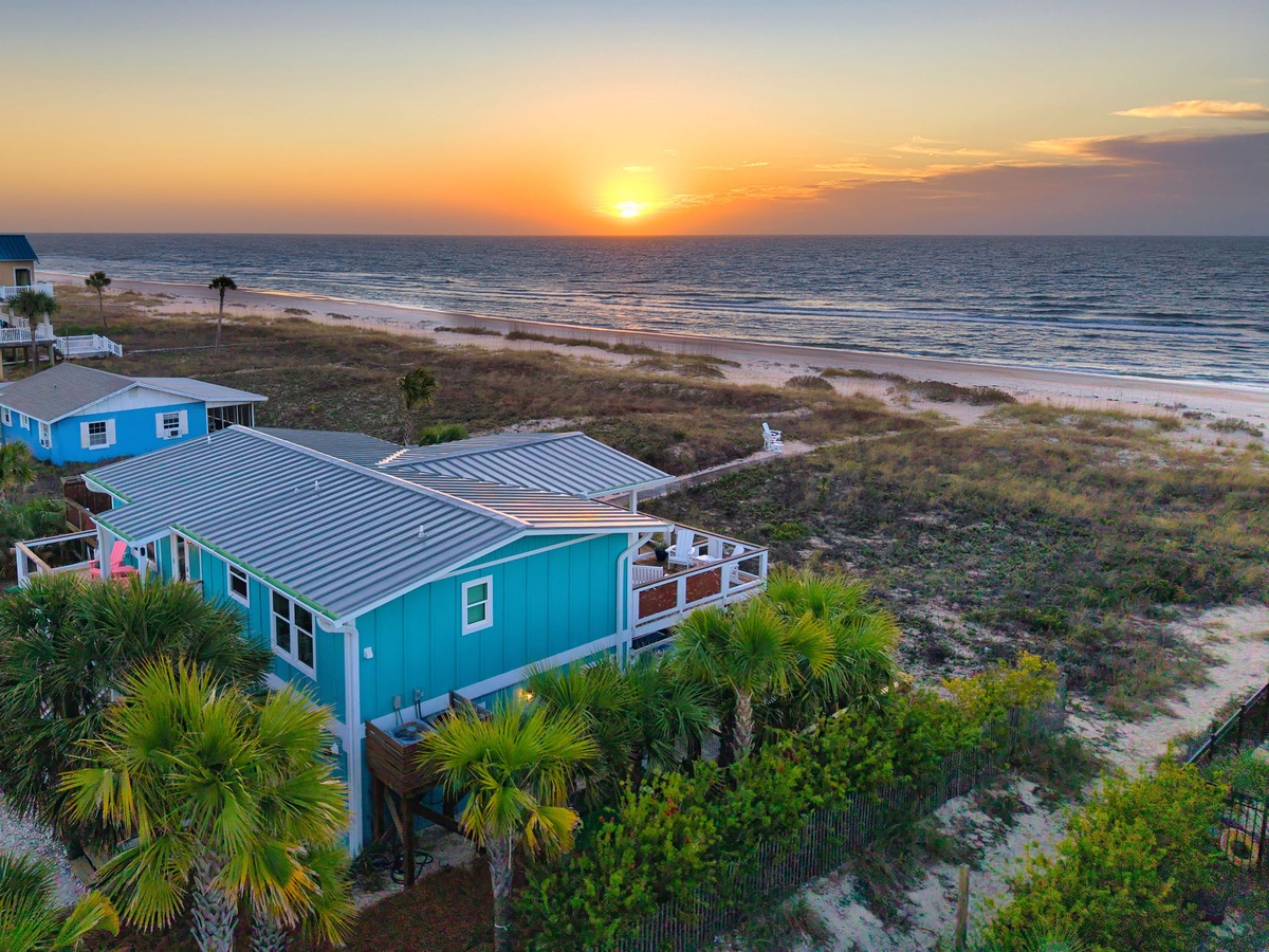 Stunning beachfront property with direct beach access and breathtaking sunrise views over the pristine coastline.