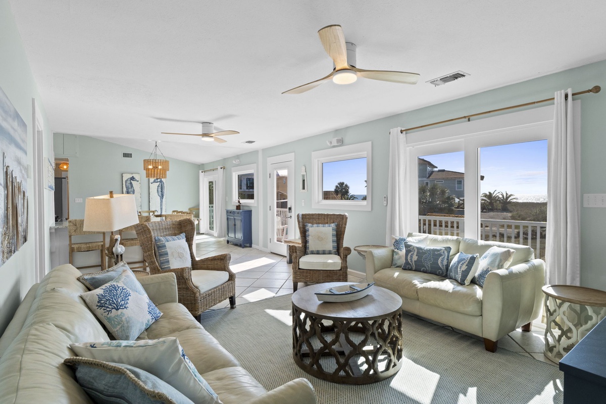 Spacious and inviting, the main living area is thoughtfully designed for both conversation and comfort.