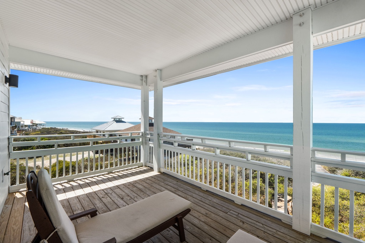 Unwind on your private covered balcony with stunning ocean views, where morning coffee and evening sunsets become daily rituals.