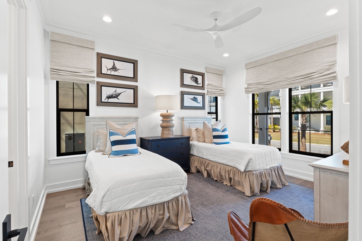 Drift off peacefully in your coastal twin bedroom, where nautical art and soft linens create your serene retreat.