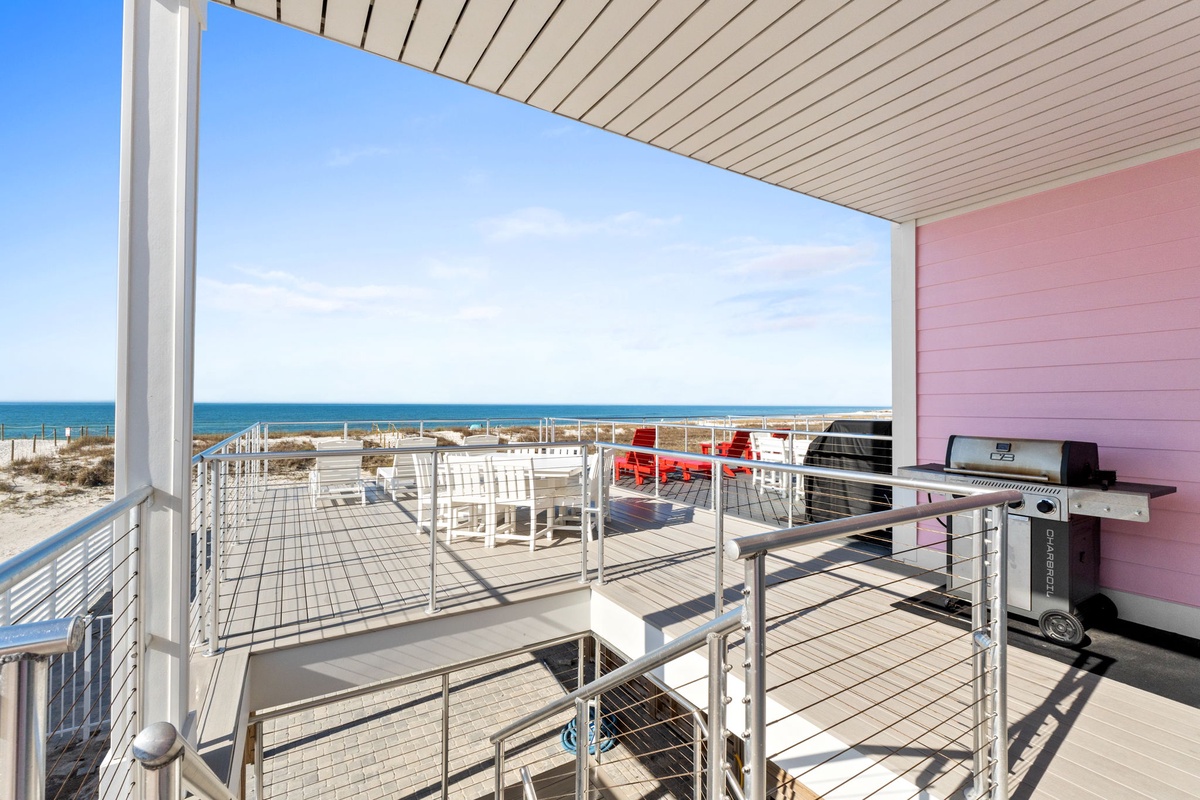 Grill your catch while soaking in stunning ocean views from your private balcony overlooking pristine beaches.