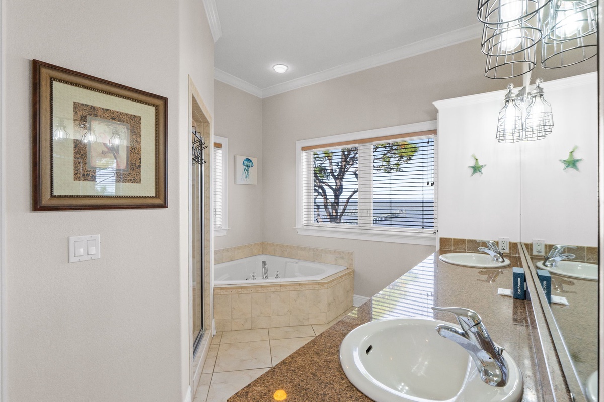 Unwind in your private spa-like bathroom with a corner tub perfect for evening soaks and granite countertops for morning routines.