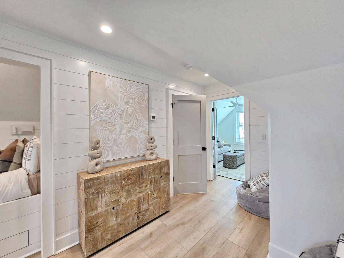 You'll love the warm wood floors and coastal-chic design.