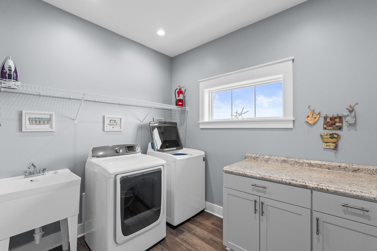 Your private laundry room keeps your clothes fresh throughout your stay, with granite counters for easy folding.