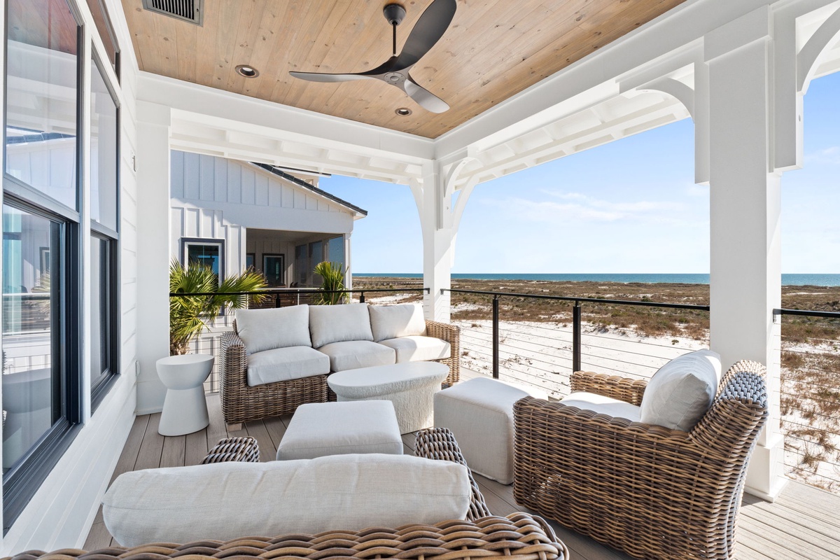 Relax in your private covered terrace with plush seating while enjoying stunning ocean views and gentle sea breezes.