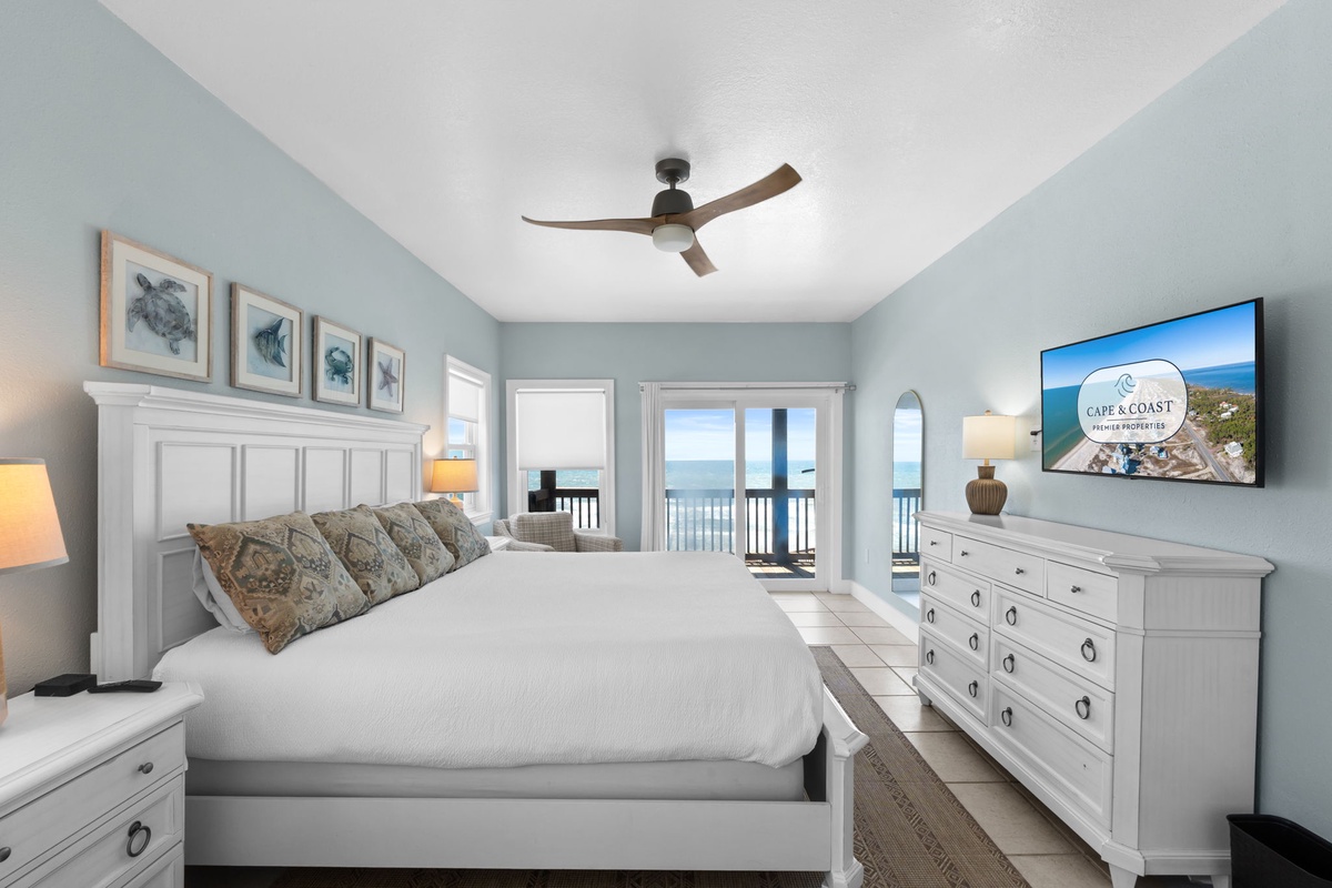 Drift off to sleep in a serene, coastal-inspired bedroom with plush bedding, soft lighting, and your own private balcony overlooking the sparkling ocean.