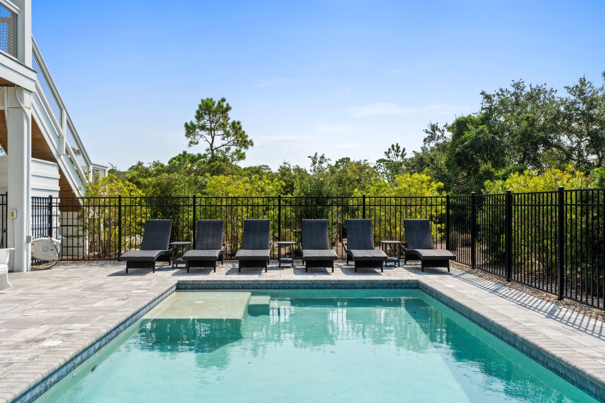 Unwind poolside on your own lounge chair, surrounded by lush greenery and peaceful privacy. The perfect spot to soak up the sunshine and recharge during your stay.