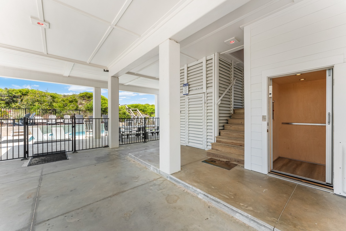 This covered terrace offers pool views and easy access with elevator convenience for stress-free arrivals.