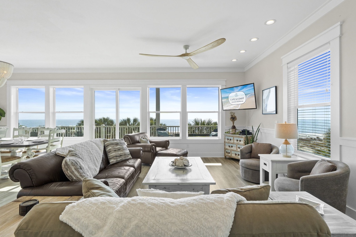 Sink into plush seating while panoramic ocean views fill every window of your bright, airy living space.
