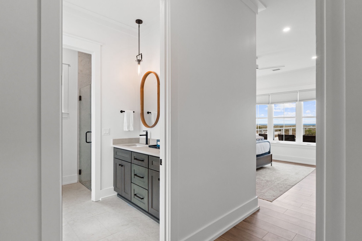 Your elegant ensuite vanity features modern finishes and connects seamlessly to your private bedroom with stunning views.