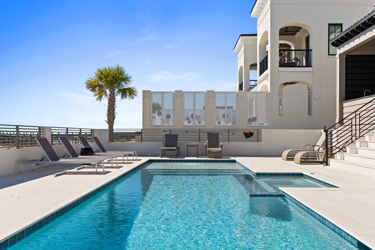 Dive into your private oasis with crystal-clear waters and modern elegance surrounding every splash.