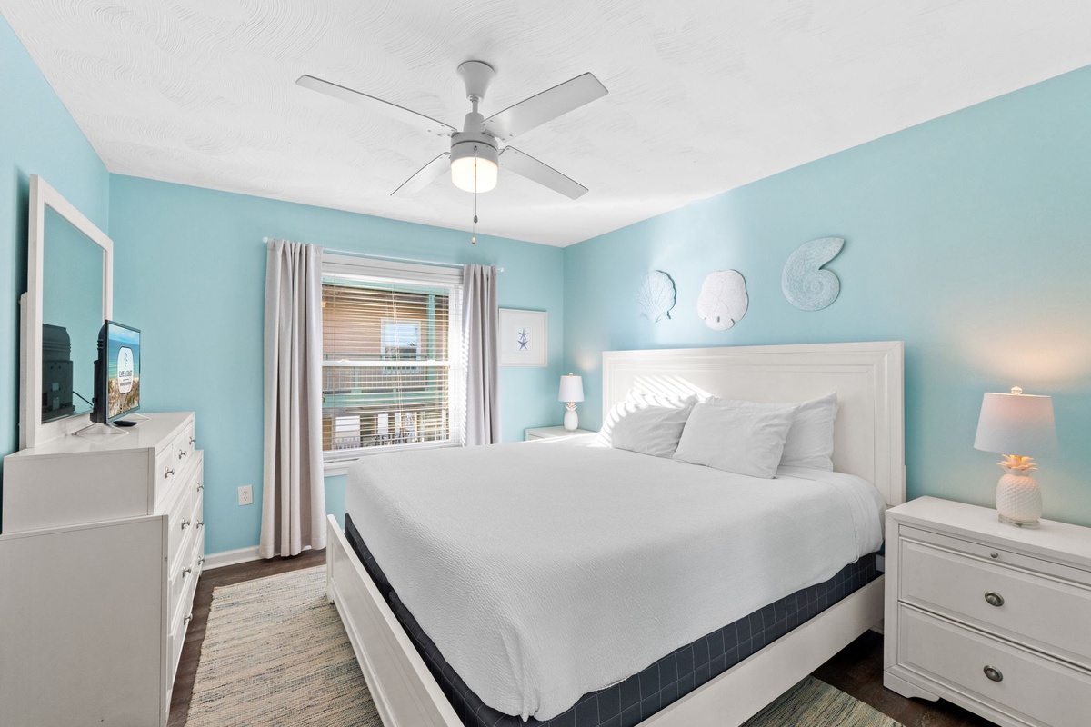 Drift into peaceful sleep surrounded by soothing coastal blues and crisp whites, with ocean-themed decor creating your perfect seaside retreat.