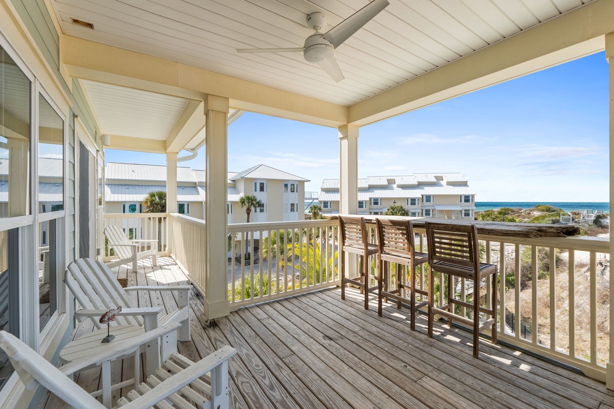 Your private covered deck offers coastal breezes and ocean glimpses, perfect for morning coffee or evening cocktails.