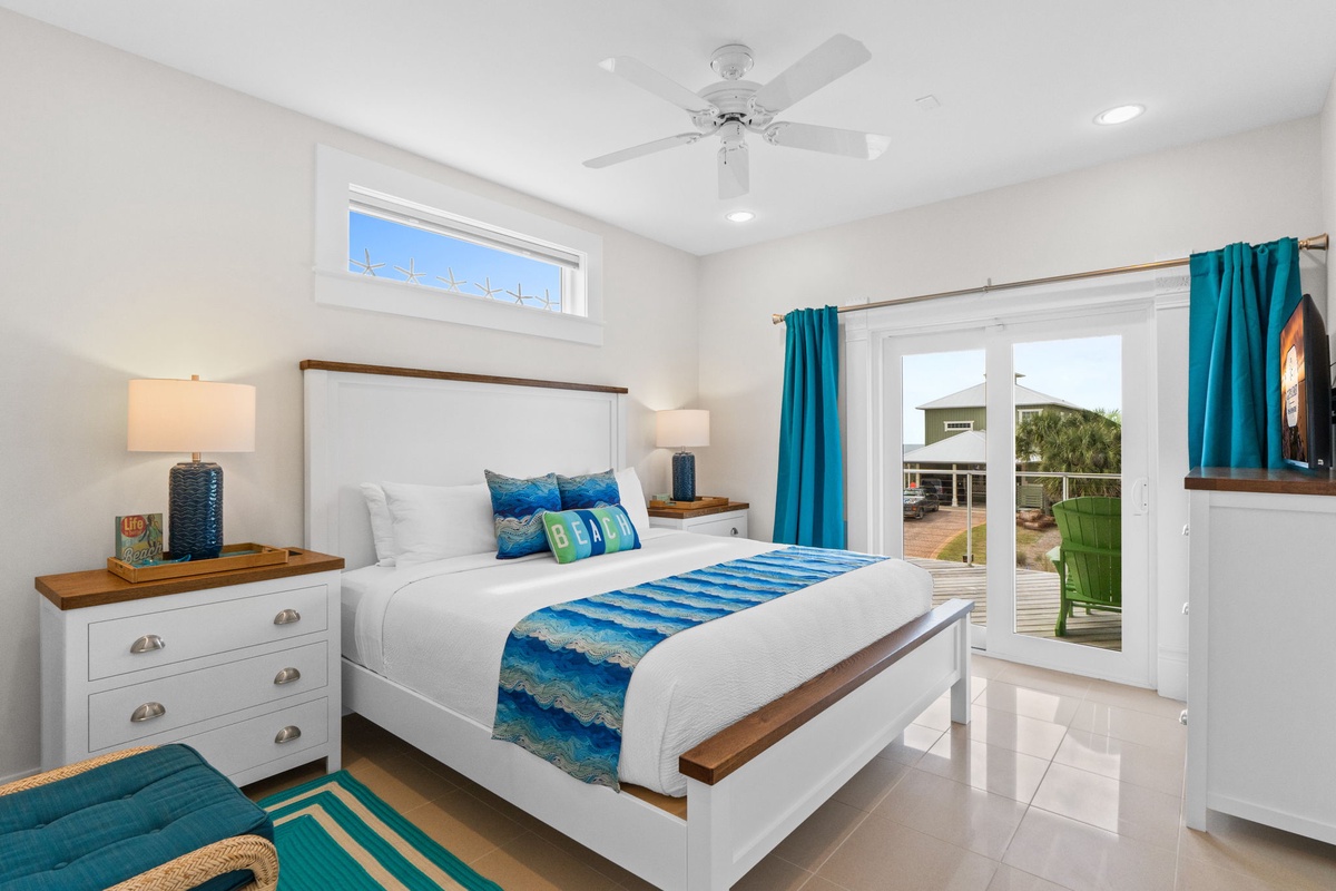 Wake up refreshed in your bright, coastal-themed bedroom with turquoise accents and ocean-inspired touches throughout.