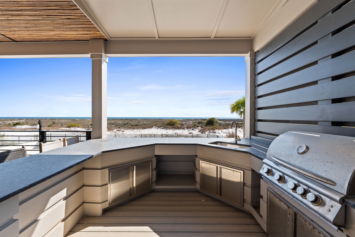 Grill your favorite meals while soaking in stunning ocean views from your private outdoor kitchen.