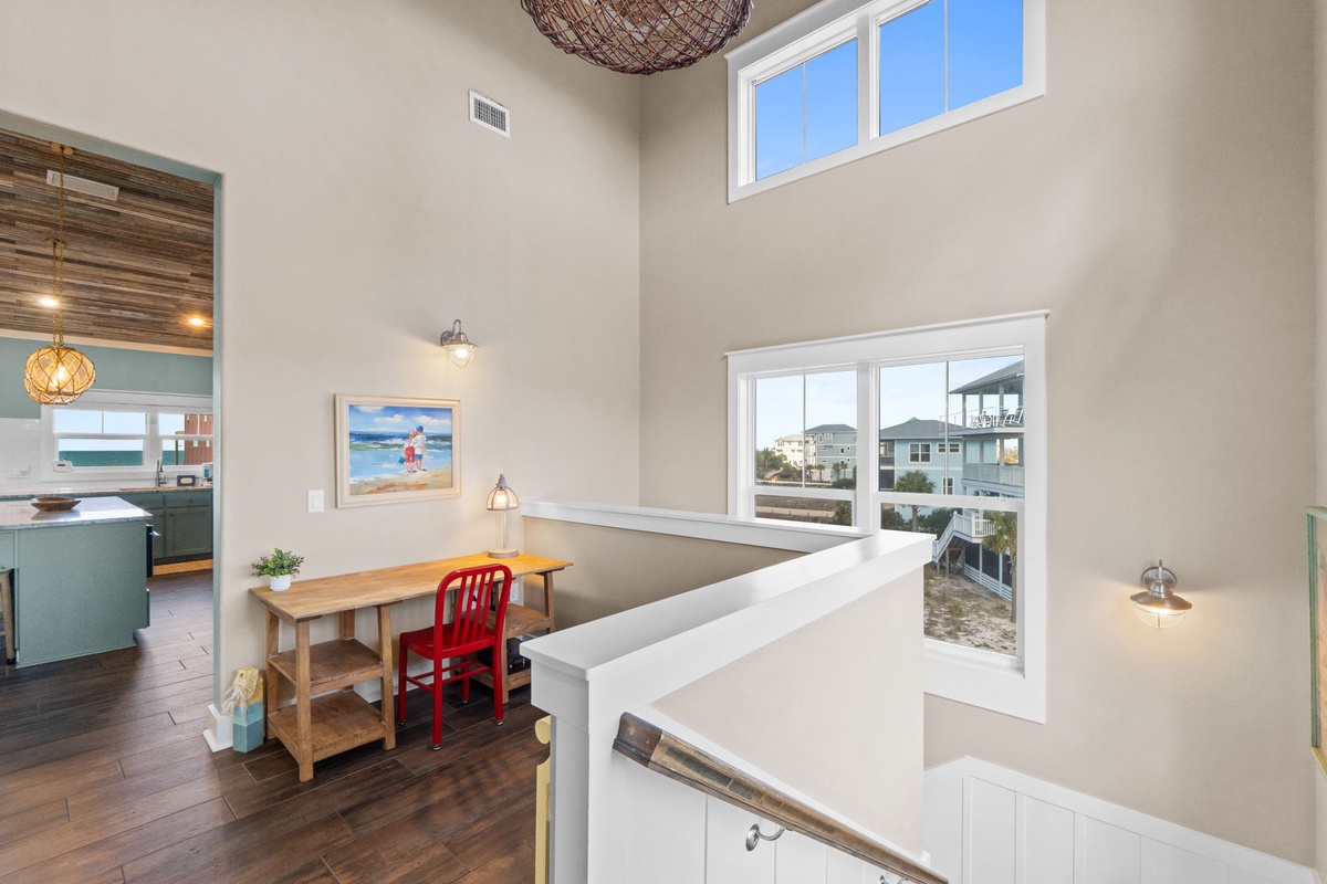 Your bright workspace offers natural light and coastal views, perfect for morning coffee or catching up on emails.