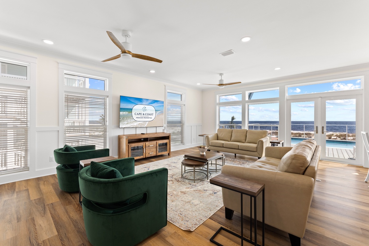 Settle into your spacious living room where ocean breezes flow through and stunning sea views create the perfect backdrop for relaxation.