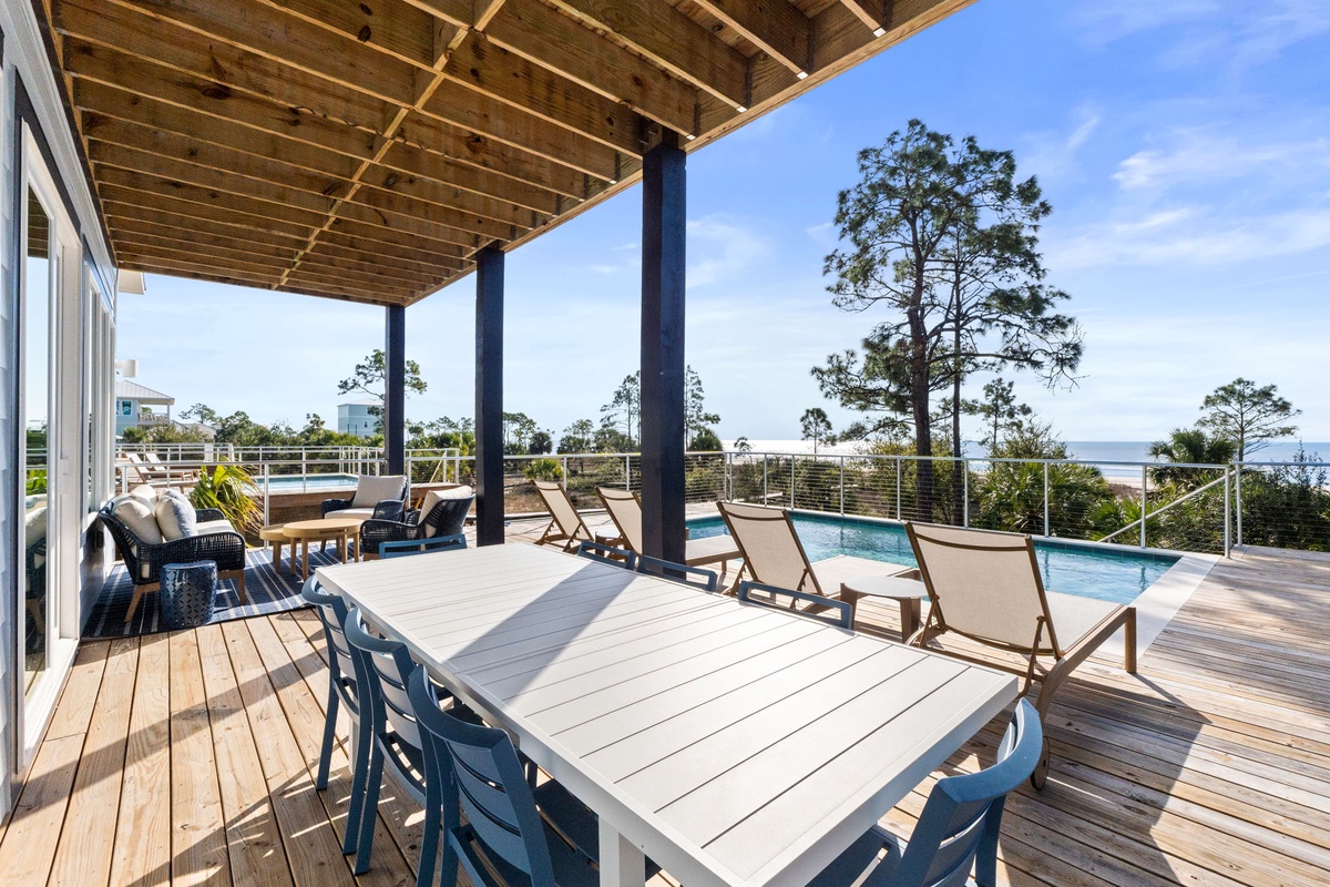 Sip your morning coffee at this stunning poolside terrace, where coastal breezes and panoramic views create your perfect outdoor sanctuary.