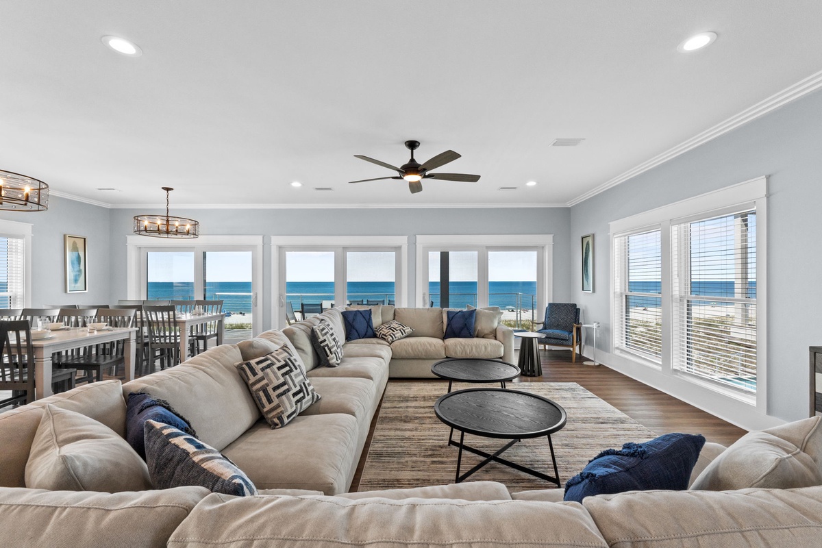 Sink into plush comfort and gaze out at endless ocean views from your spacious living area, where coastal calm meets modern elegance.