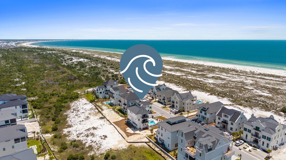 Stunning beachfront community positioned along pristine emerald waters and white sand beaches, offering coastal living in a serene natural setting.