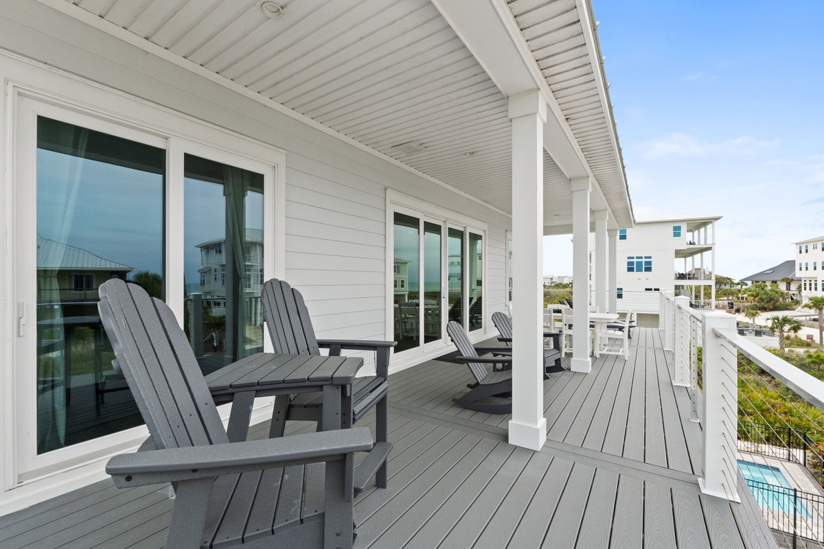 Settle into comfortable Adirondack chairs on your private covered deck and soak up coastal breezes.
