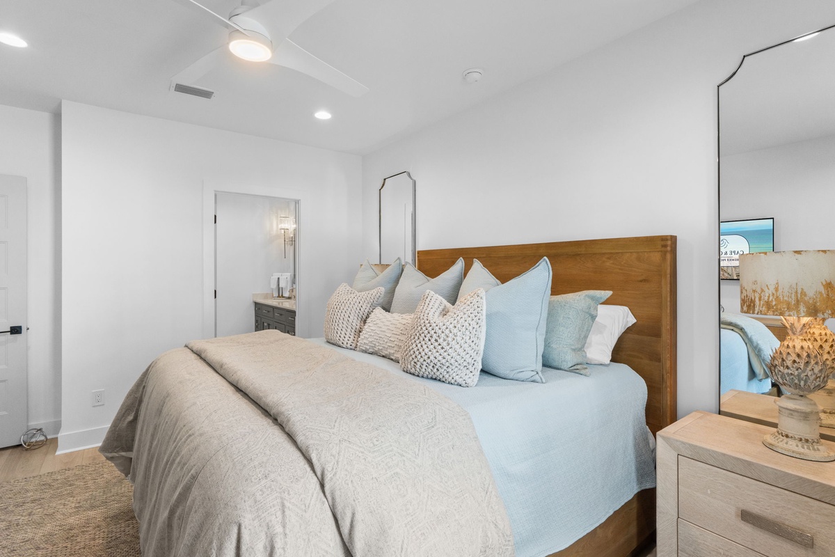 Sink into your cloud-soft bed with calming coastal hues and plush pillows that promise the perfect night's sleep.