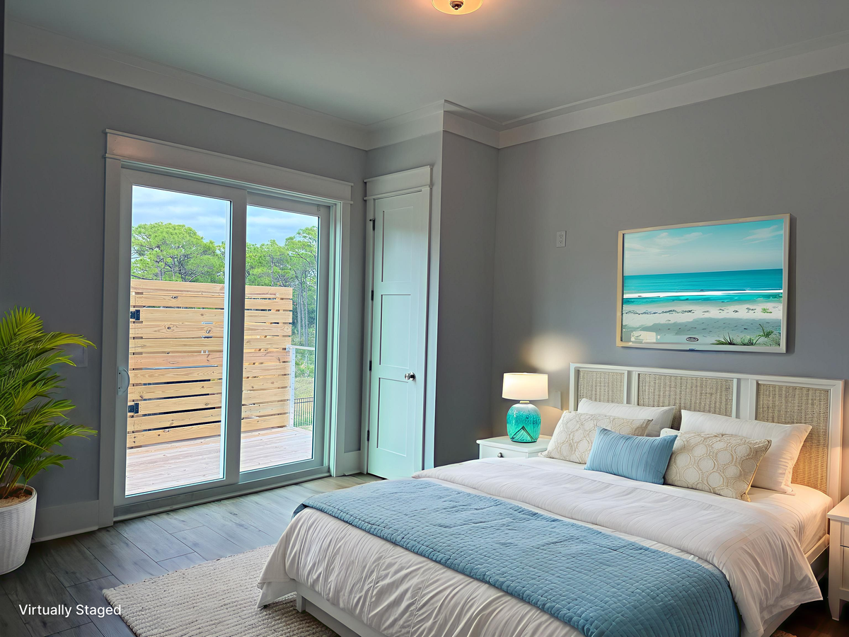 Drift off peacefully in your serene bedroom, where coastal blues and crisp whites create a tranquil retreat with private balcony access.