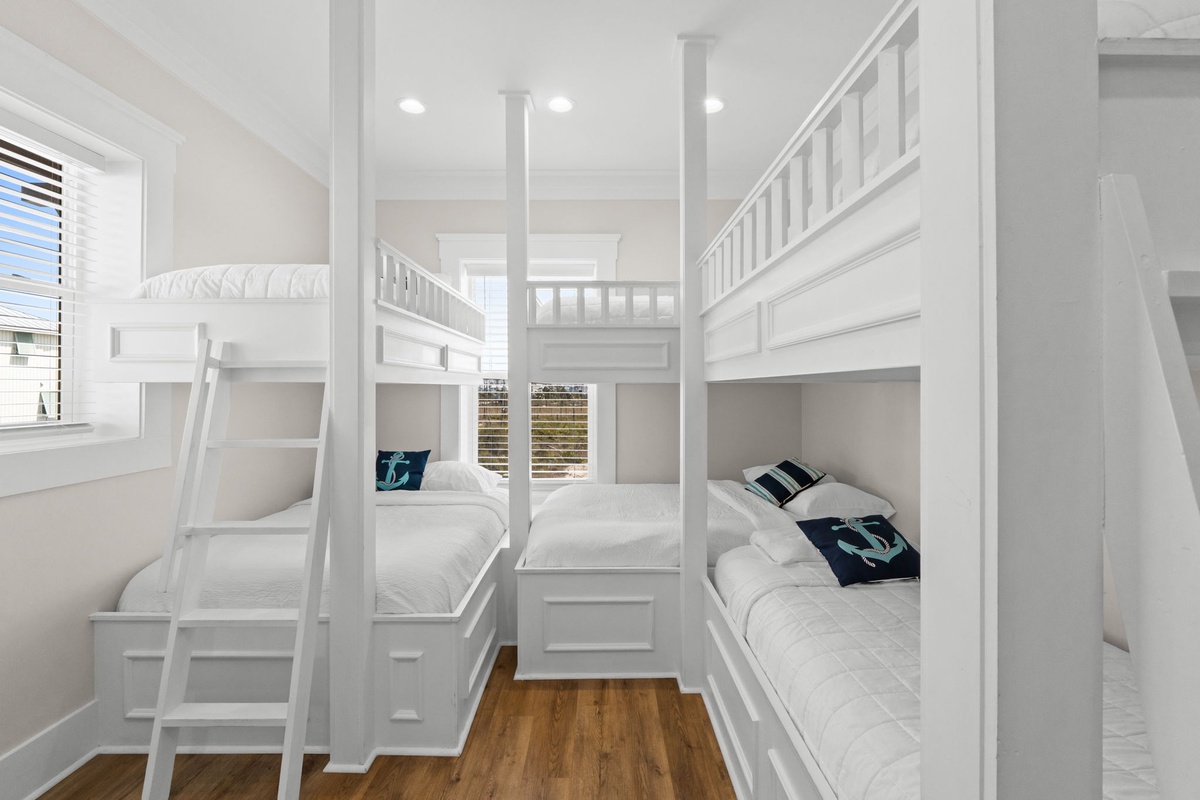 Your private bunk room features custom built-in beds with crisp linens, perfect for families or groups sharing space together.