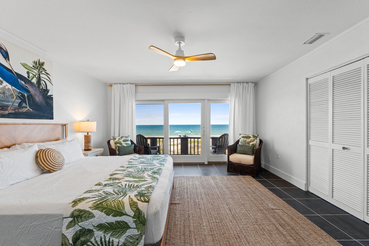 Wake up to turquoise waves and unobstructed sea views from your bed. Coastal breezes, coastal-inspired decor, and a private balcony overlooking the beach await you.