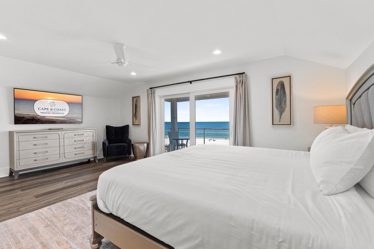 Wake to stunning ocean views from your private retreat. Floor-to-ceiling glass doors frame the beach just steps away, inviting you to drift off to the sound of waves.