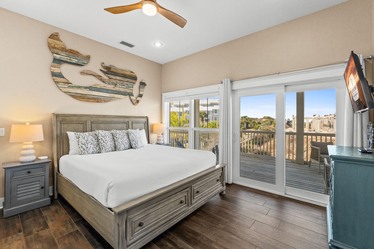 Wake up to stunning views from your comfortable master bedroom, with direct balcony access for morning coffee and coastal breeze.
