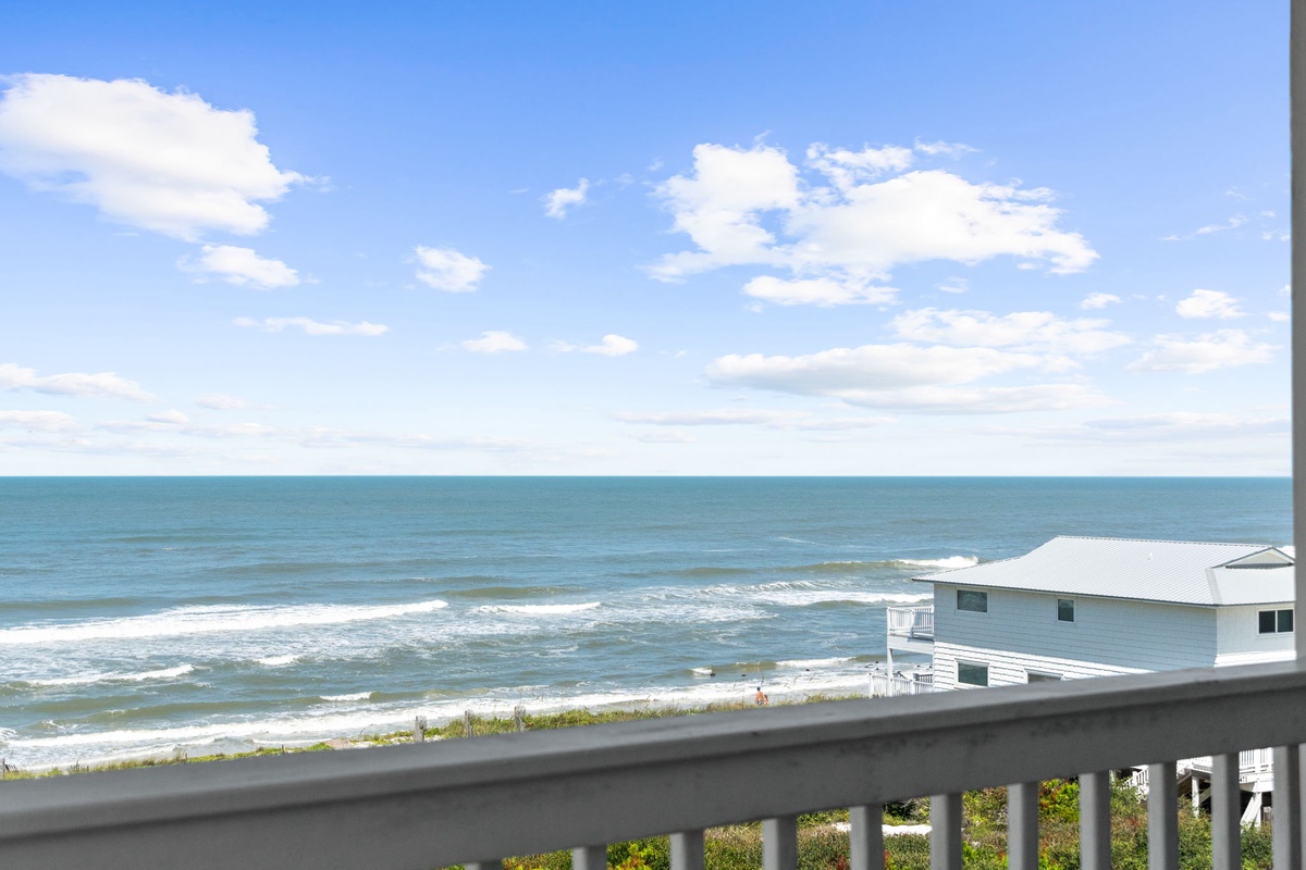 Step onto your balcony and breathe in the fresh ocean air. The sea stretches endlessly before you, its rhythmic waves creating the perfect soundtrack to your beachside escape.