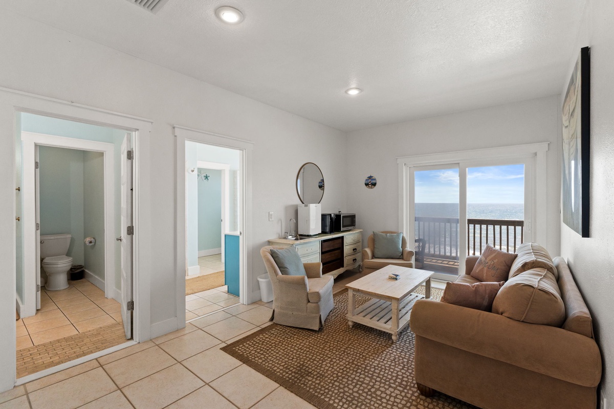 Relax in your coastal retreat where ocean views frame every moment, soft coastal tones calm your mind, and the gentle sea breeze drifts through your private balcony.