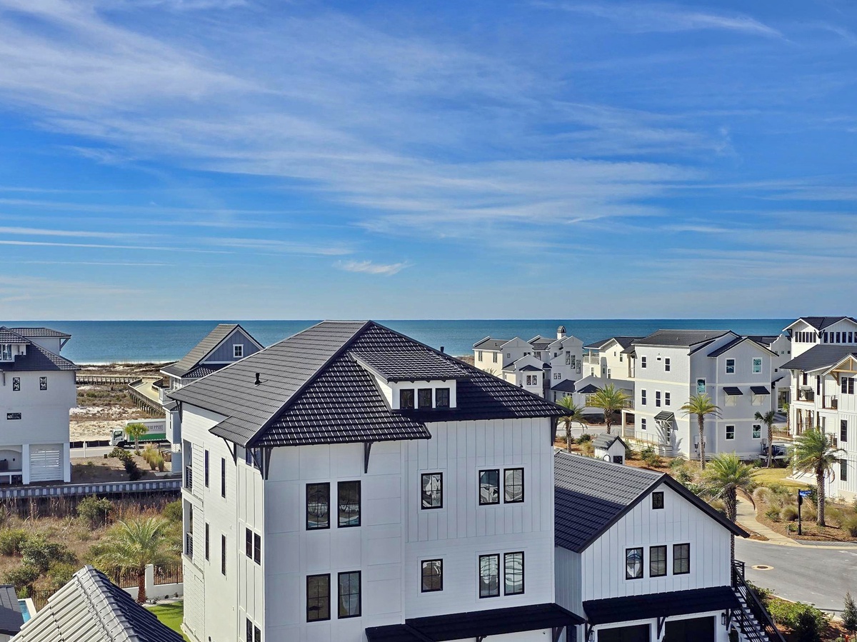 Coastal rental property with stunning ocean proximity and charming beach community surroundings.