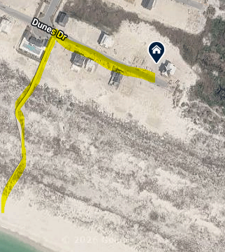 Aerial view shows beach access via community boardwalk.