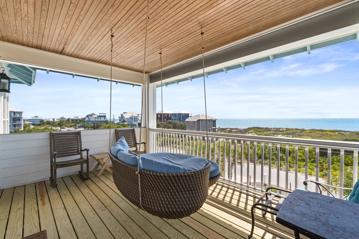 Sway gently on your private balcony swing while ocean breezes carry away your worries and endless sea views stretch before you.