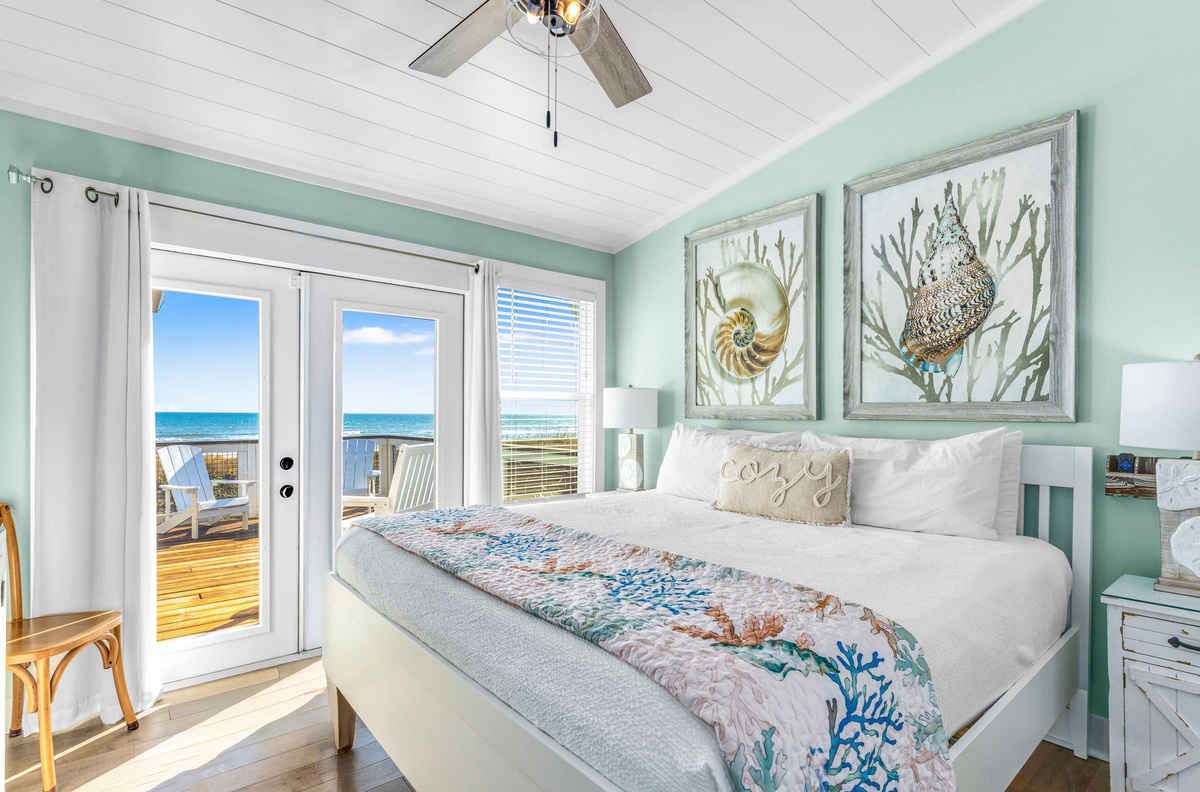 Wake up to stunning ocean views in your coastal bedroom retreat, where sea-themed artwork and soothing sea salt walls create perfect seaside serenity.