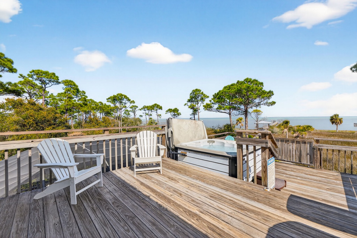 Soak in your private hot tub while coastal breezes carry the sound of waves. This elevated deck offers the perfect retreat for sunset cocktails.