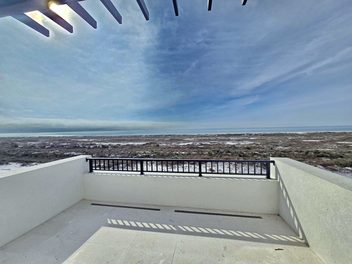 Step onto your private terrace and breathe in the fresh ocean air while gazing across endless coastal vistas.